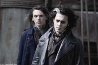 Jamie Campbell Bower and Johnny Depp in "Sweeney Todd: The Demon Barber of Fleet Street."
