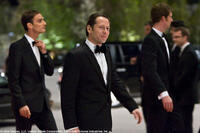 Dominic Greene (Mathieu Amalric) and Elvis (Anatole Taubman) arrive at the Opera House in Austria in "Quantum Solace."