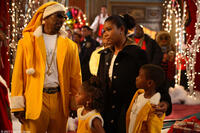 Charlie Murphy and Gabrielle Union in "The Perfect Holiday."