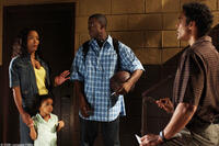 Brenda (Angela Bassett), Lena (Mariana Tolbert), Michael (Lance Gross) and Harry (Rick Fox) in "Meet the Browns."