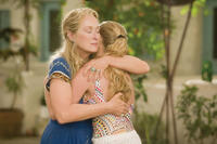 Donna Sheridan (MERYL STREEP) shares an intimate moment with daughter Sophie (AMANDA SEYFRIED) in "Mamma Mia!"