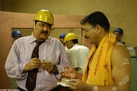 Satish Shah as Devendra Tiwali and Ulhas Phatak as Shastri in "Offshore."