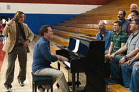 High school drama teacher Dana Marschz (Steve Coogan, at left) and the Gay Men's Choir of Tucson, Arizona (at right) team up to put on a show in "Hamlet 2."