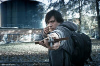 Ben (Greg Timmermans) shooting a crossbow in "Ben X."
