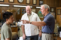 Bee Vang as Thao, John Carroll Lynch as Martin and Clint Eastwood as Walt Kowalski in "Gran Torino."
