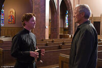 Christopher Carley as Father Janovich and Clint Eastwood as Walt Kowalski in "Gran Torino."