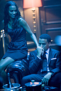 Zoe Saldana as Lilli and Michael Ealy as Jake in "Takers."