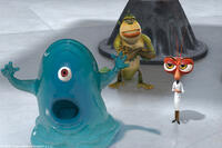Seth Rogen as B.O.B., Will Arnett as The Missing Link and Hugh Laurie as Dr. Cockroach, Ph.d. in "Monsters Vs. Aliens."