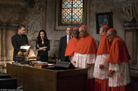 Tom Hanks as Robert Langdon, Ayelet Zurer as Vittoria Vetra, Thure Lindhardt as Chartrand, unidentified clergyman, Armin Mueller-Stahl as Cardinal Straus, Rance Howard as clergyman and unidentified clergyman in "Angels & Demons."