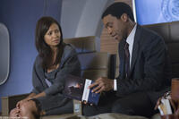 Thandie Newton as Laura Wilson and Chiwetel Ejiofor as Adrian Helmsley in "2012."