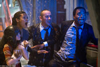 Morgan Lily as Lilly Curtis,  Thandie Newton as Laura Wilson, unknown actor, and Chiwetel Ejiofor as Adrian Helmsley in "2012."
