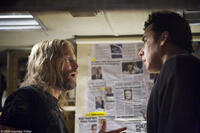 Woody Harrelson as Charlie Frost and John Cusack as Jackson Curtis in "2012."
