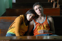 Paulina Gaitan as Sayra and Edgar Flores as Willy/El Casper in "Sin Nombre."