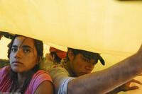 Paulina Gaitan as Sayra and Guillermo Villegas in "Sin Nombre."