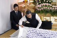 Masahiro Motoki as Daigo Kobayashi and Tsutomu Yamazaki as Sasaki in "Okuribito."