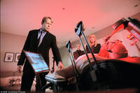 Bruce Willis as Greer and Radha Mitchell as Peters in "Surrogates."