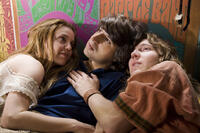 Kelli Garner, Demetri Martin as Elliot Tiber and Paul Dano in "Taking Woodstock."