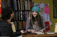Lou Taylor Pucci as Kris and Kat Dennings as Dahlia in "The Answer Man."