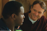 Quinton Aaron as Michael Oher and Tim McGraw as Sean Tuohy in "The Blind Side."