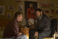 Steve Evets as Eric Bishop and Eric Cantona as himself in "Looking for Eric."