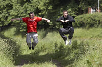 Steve Evets as Eric Bishop and Eric Cantona as himself in "Looking for Eric."