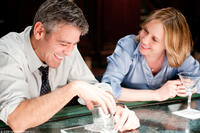 George Clooney as Ryan Bingham and Vera Farmiga as Alex Goran in "Up in the Air."