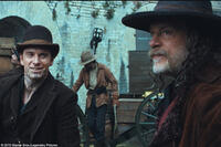 Michael Fassbender as Burke and John Malkovich as Quentin Turnbull in "Jonah Hex."