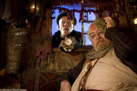 Tom Waits as Mr. Nick and Christopher Plummer as Dr. Parnassus in "The Imaginarium of Doctor Parnassus."