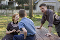 Jessica Chastain as Mrs. O'Brien, Tye Sheridan and Brad Pitt as Mr. O'Brien in ``The Tree of Life.''