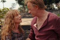 Isabelle Huppert as Maria Vial and Christopher Lambert as Andr? Vial in "White Material."