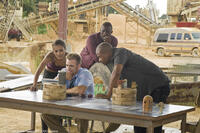 Zoe Saldana as Aisha, Chris Evans as Jensen, Idris Elba as Roque and Columbus Short as Pooch in "The Losers."