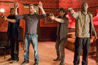 Columbus Short as Pooch, Chris Evans as Jensen, Oscar Jaenada as Cougar and Idris Elba as Roque in "The Losers."