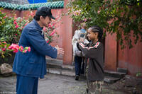 Jackie Chan as Mr. Han and Jaden Smith as Dre in "The Karate Kid."