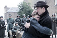Martijn Lakemeier as Michiel and Raymond Thiry as Johan in ``Winter in Wartime.''