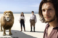The "Great Lion" Aslan, Georgie Henley as Lucy , Skandar Keynes as Edmund and Ben Barnes as Caspian in ``The Chronicles of Narnia: The Voyage of the Dawn Treader.''