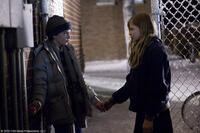 Kodi Smit-McPhee as Owen and Chloe Grace Moretz as Abby in "Let Me In."