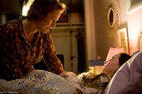 Penelope Ann Miller as Trina and Madeline Carroll as Juli in "Flipped."