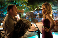 Kevin James as Griffin Keyes and Leslie Bibb as Stephanie in ``Zookeeper.''