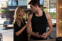 Maggie Grace as Lily and Oliver Jackson-Cohen as Killer in "Faster."