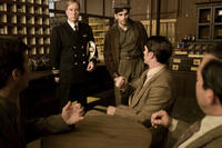 Lee Perkins as F. Ellis Coburn and Donal Thoms-Cappello as Eddie Doyle in ``The Red Machine.''