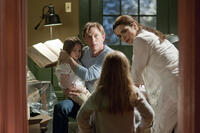 Claire Geare as Dee Dee, Daniel Craig as Will Atenton and Rachel Weisz as Libby Atenton in ``Dream House.''