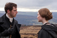 Jamie Bell as St. John and Mia Wasikowska as Jane Eyre in ``Jane Eyre.''