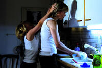 Quentin Grosset as Lucien and Catherine Tanvier as La m?re in ``Film Socialisme.''