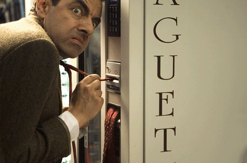 Mr. Bean (Rowan Atkinson), stuck in a familiar position, in "Mr. Bean's Holiday."