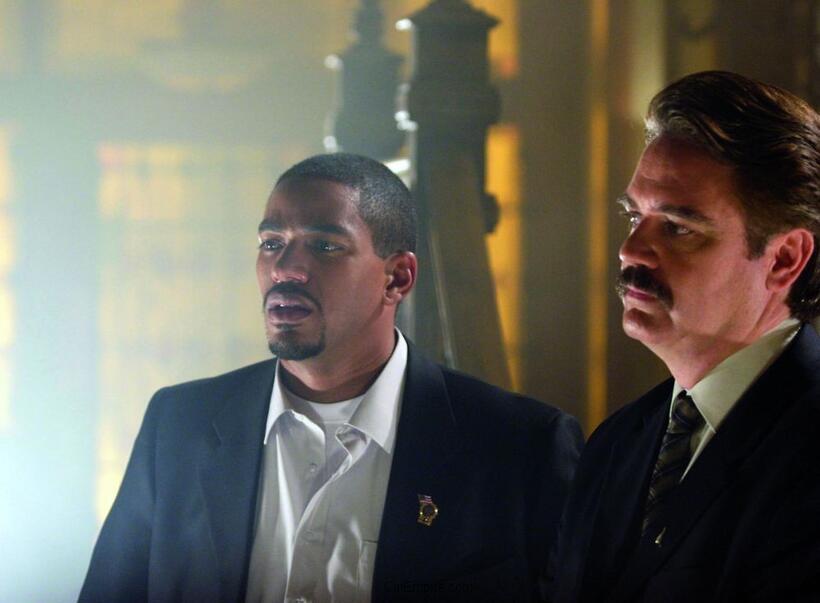 Laz Alonso and Michael Harney in "Captivity."