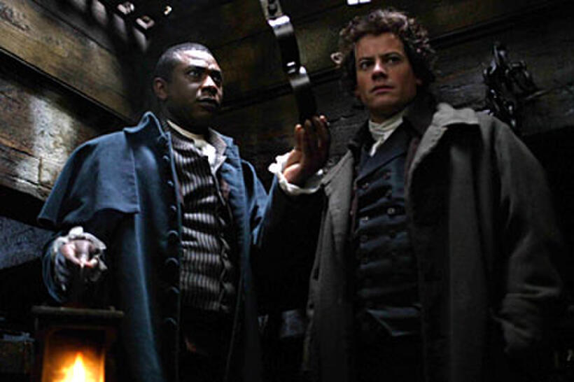 Oloudah (Youssou N’Dour) shows William Wilberforce (Ioan Gruffudd) around a slave trade ship in "Amazing Grace."