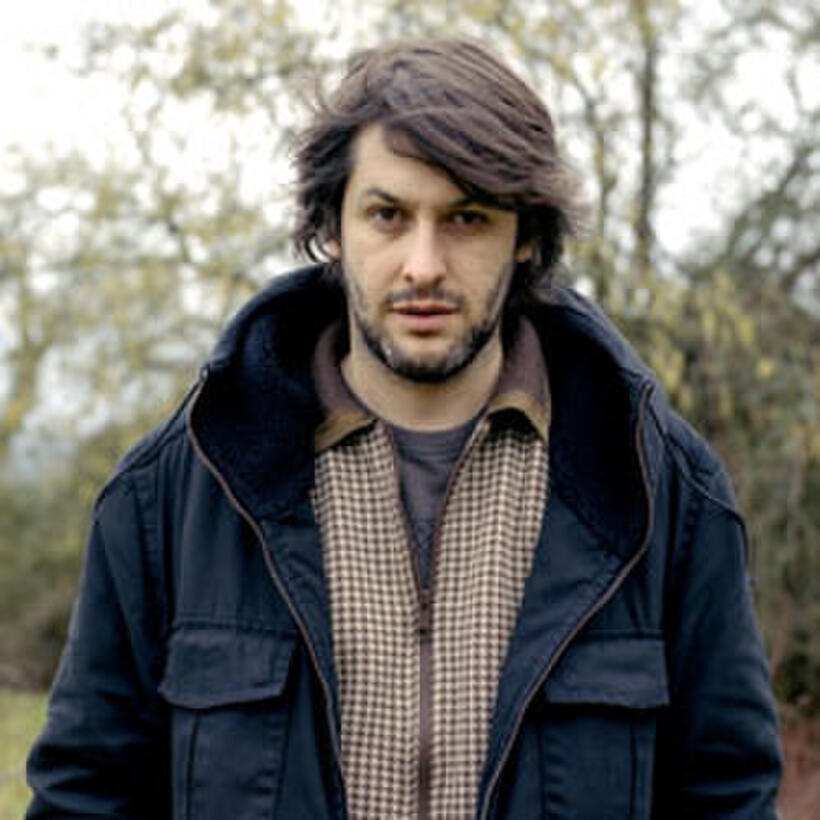 Director Christophe Honoré on the set of "Dans Paris."