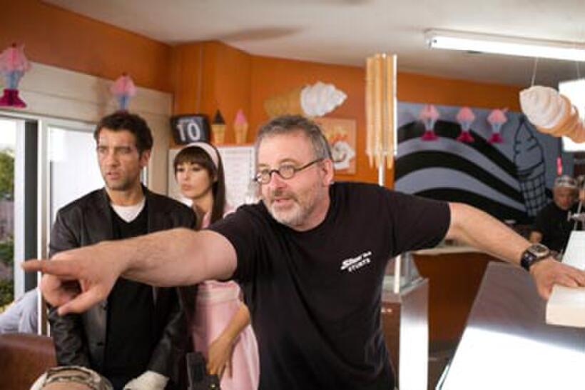 Clive Owen, Monica Bellucci and director Michael Davis on the set of "Shoot 'Em Up."