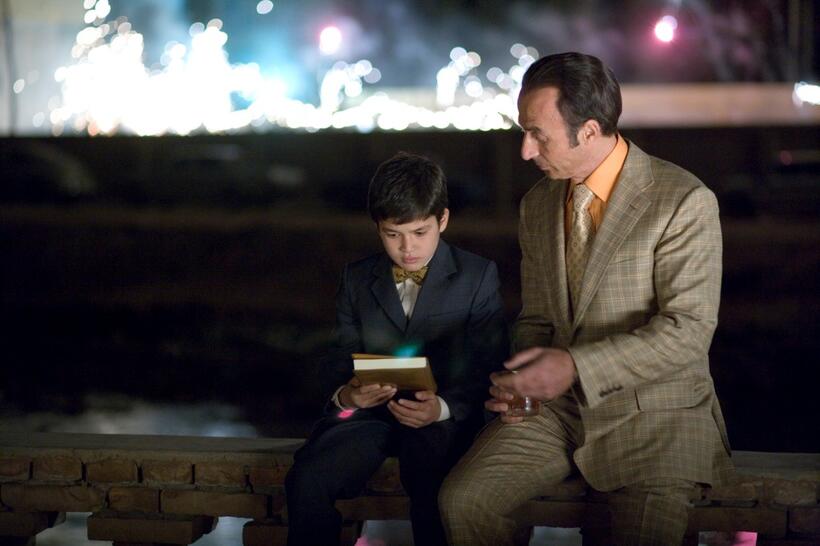 Zekiria Ebrahimi as young Amir and Shaun Toub as Rahim Khan in "The Kite Runner".