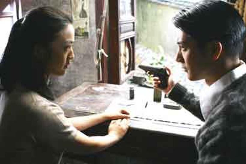 Tang Wei (left) and Wang Lee Hom (right) in "Lust, Caution." 